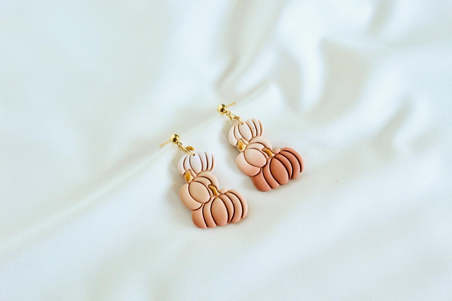 Stacked pumpkin earrings for Halloween