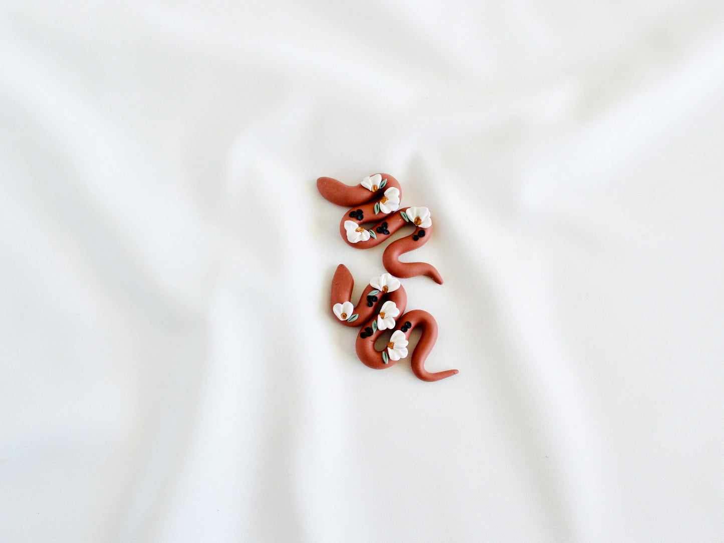 Boho floral garden snake earrings