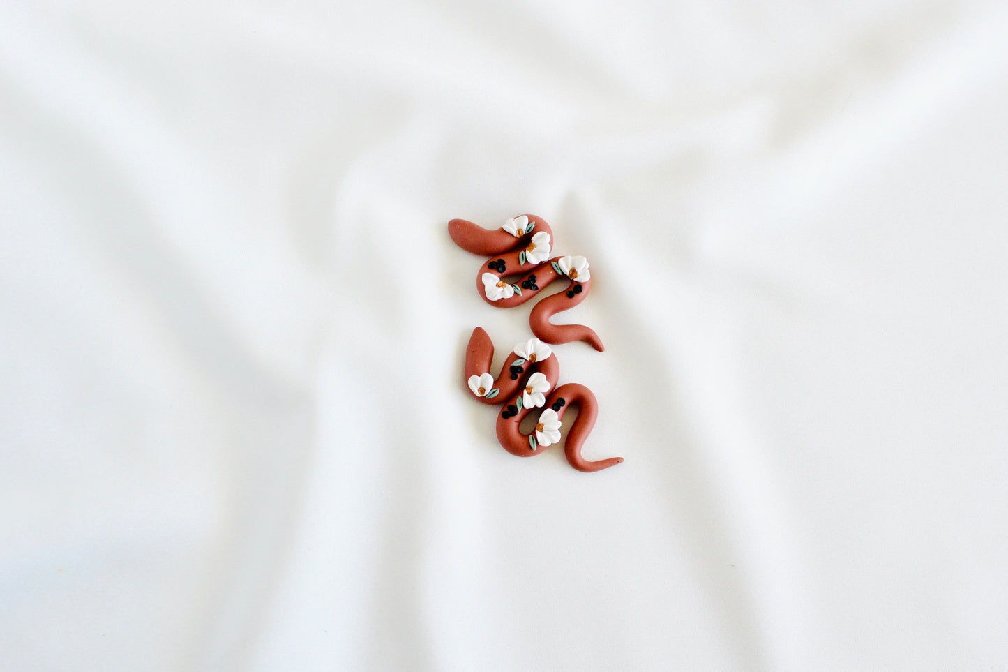 Boho floral garden snake earrings