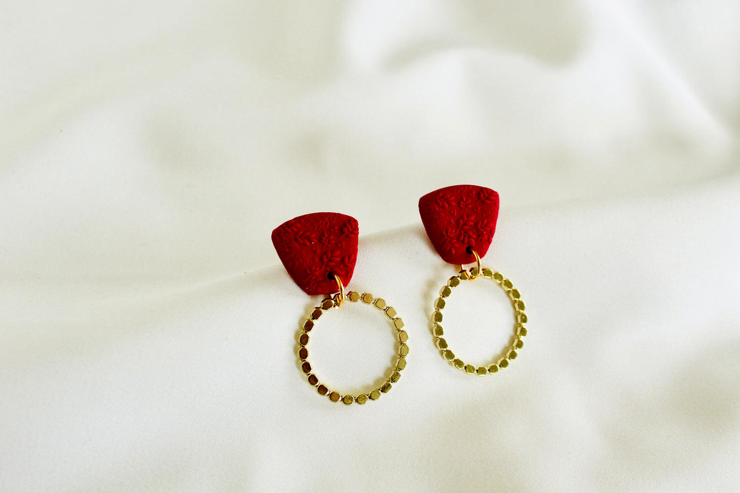 Red elegant statement earrings
