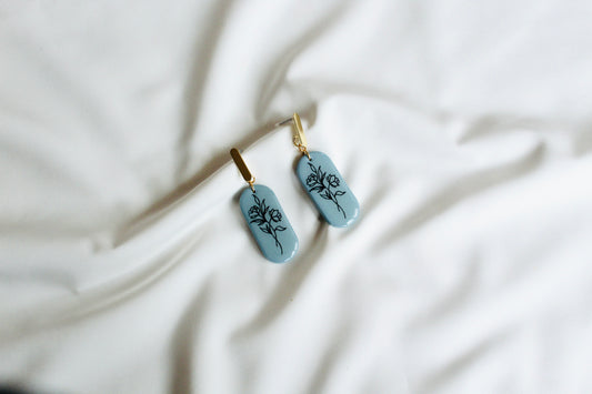Soft blue floral texture statement earrings